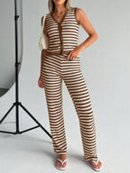 Striped knit V-neck sleeveless top and flare pants set by Plush Fashion Hub, showing the stylish, fitted top and flowing pants.