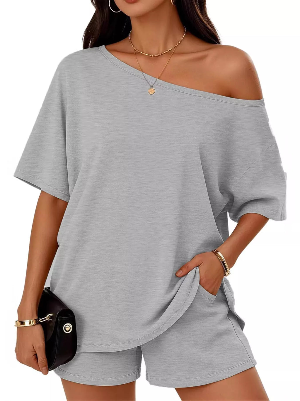Plus size women's boat neck T-shirt and shorts lounge set by Trendsi, comfortable casual clothing for relaxed wear.