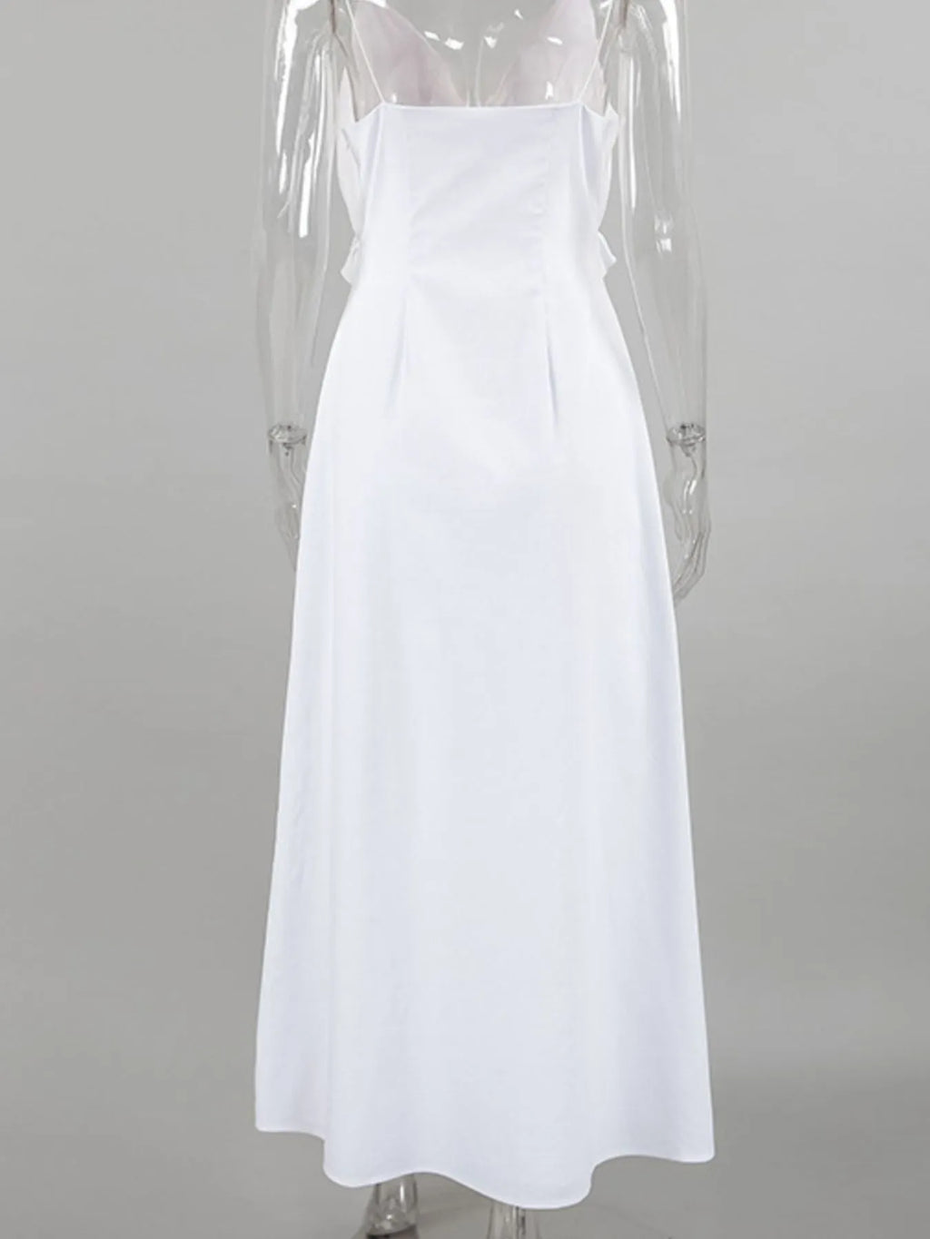 Women's ruffled V-neck cotton maxi dress by Trendsi, flowy boho summer dress with ruffle details and a relaxed fit.