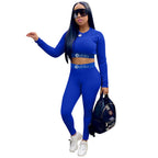 Women's sports two-piece set with letter print from Trendy Attic Store01, featuring a sporty top and matching shorts.