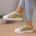 Women’s low top floral canvas shoes by Trendy Attic Store01 featuring a breathable design and casual style.