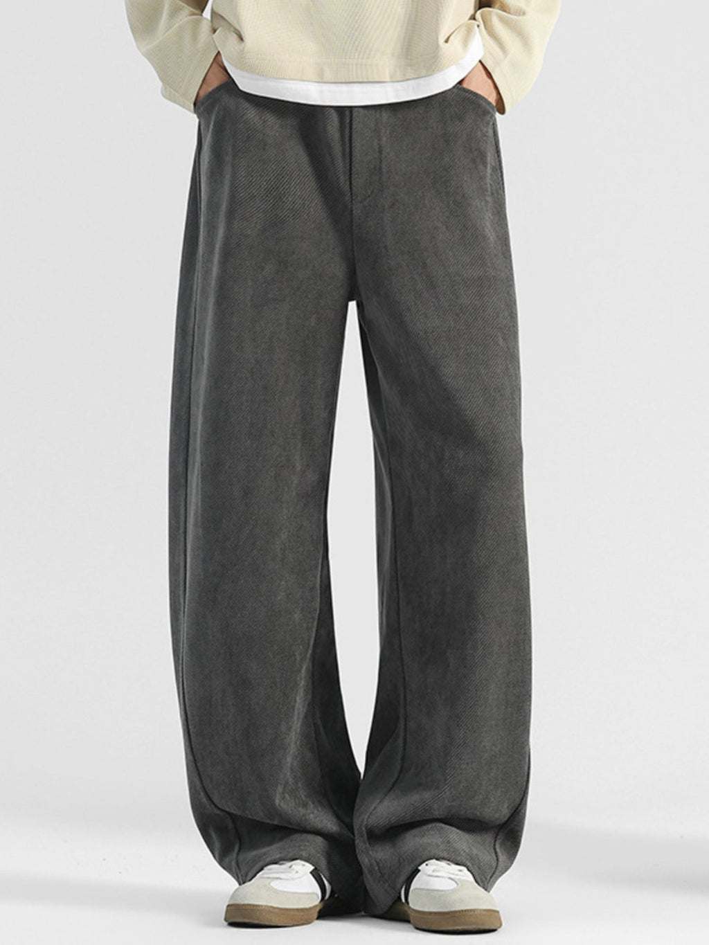 Men's premium loose fit pocket pants by Trendsi featuring casual, comfortable plus size trousers with side pockets.