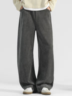 Men's premium loose fit pocket pants by Trendsi featuring casual, comfortable plus size trousers with side pockets.