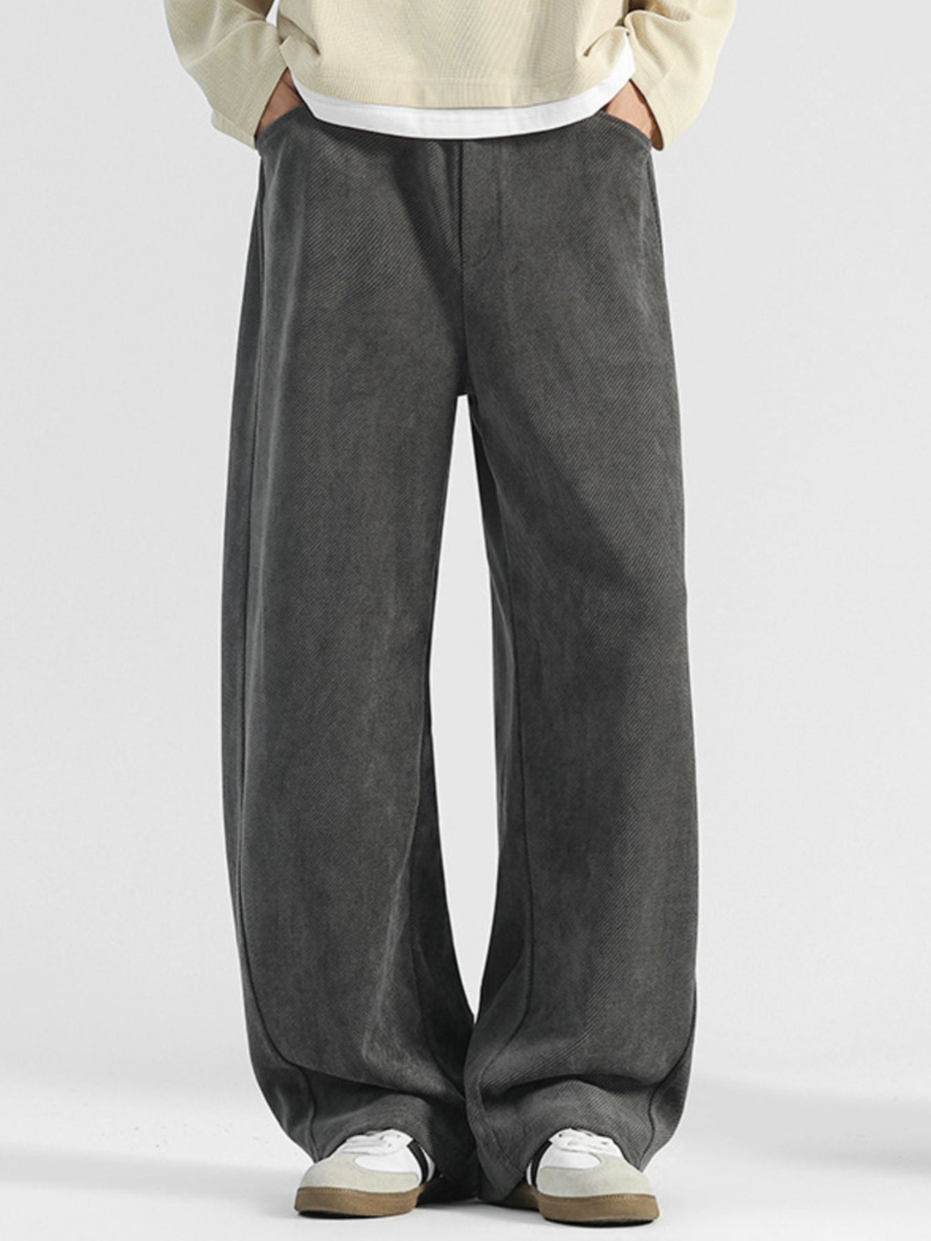 Men's premium loose fit pocket pants by Trendsi featuring casual, comfortable plus size trousers with side pockets.