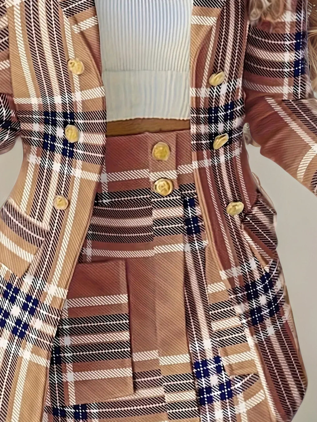 Women’s plaid skirt suit set by FitiqueFit, featuring an elegant casualwear look with a fitted plaid blazer and matching skirt.