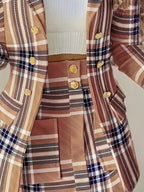 Women’s plaid skirt suit set by FitiqueFit, featuring an elegant casualwear look with a fitted plaid blazer and matching skirt.