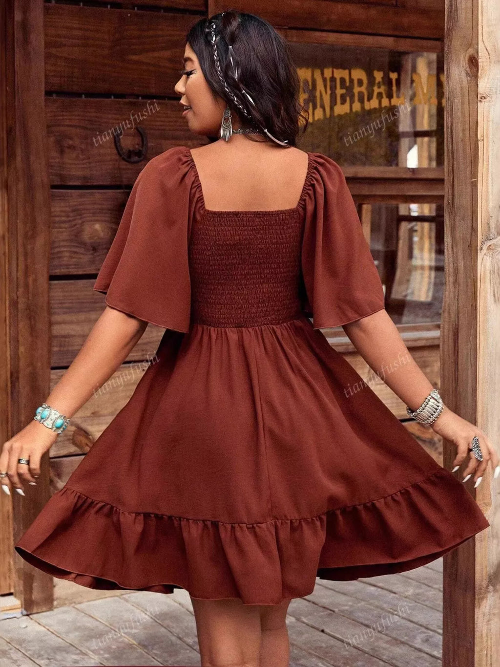 Embroidered flutter sleeve mini dress by Shopimist featuring intricate embroidery and a flowy, feminine silhouette.