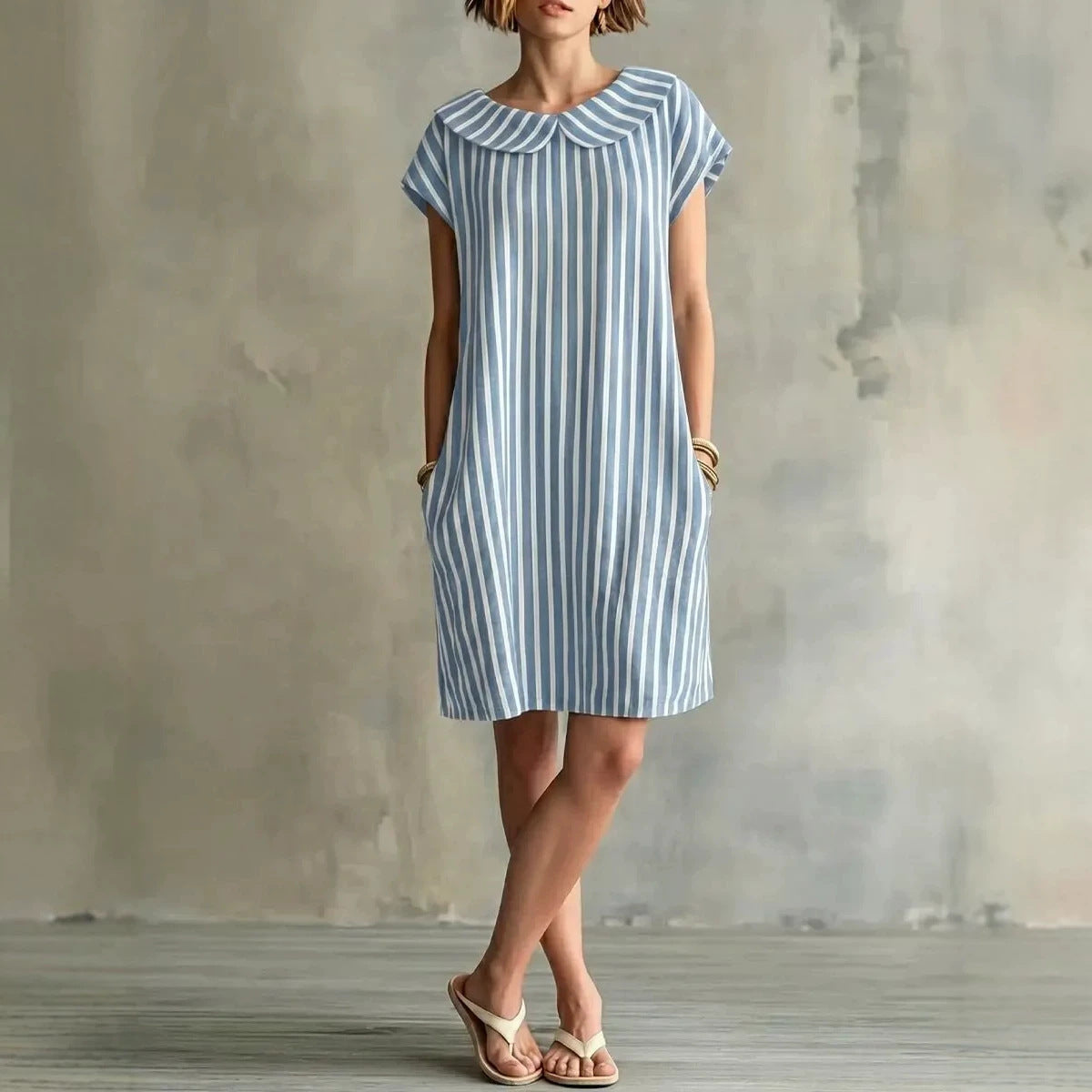 Women's striped high-waist sleeveless bodycon midi dress from Plush Fashion Hub, casualwear style, shown on a model.