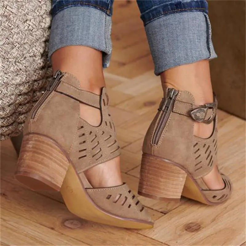Women's floral cutout chunky heel sandals by Trendy Attic Store01 featuring open toe design and stylish floral accents.