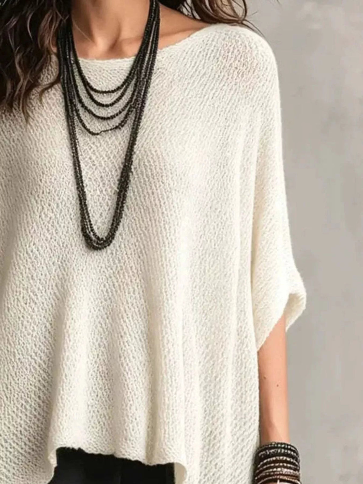Plus size Plush Fashion Hub knit top with a loose fit and round neckline, shown in a full-size, soft and comfortable fabric.