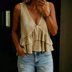 Solid-colored women's V-neck sleeveless top with ruffled details, perfect for spring and summer, by Plush Fashion Hub.