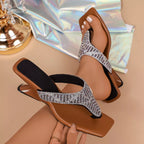 Rhinestone toe post sandals by Shopimist featuring sparkling stones and a comfortable flat sole, perfect for summer wear.