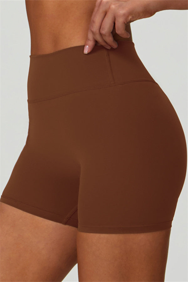 Fitglutes Activewear Seraphine sports bra and shorts 2-piece set, gymwear and workout clothes, shown on a model during exercise.