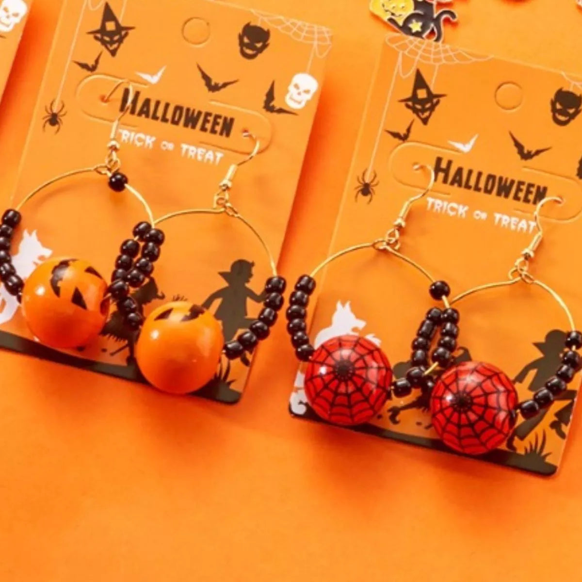 Gold-plated Halloween bead earrings with spooky charm, styled with 18K gold plating by Shopimist.