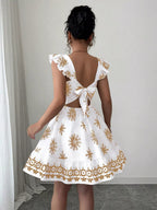 Printed bow back square neck mini dress from Shopimist featuring a stylish square neckline and playful bow detail on the back.