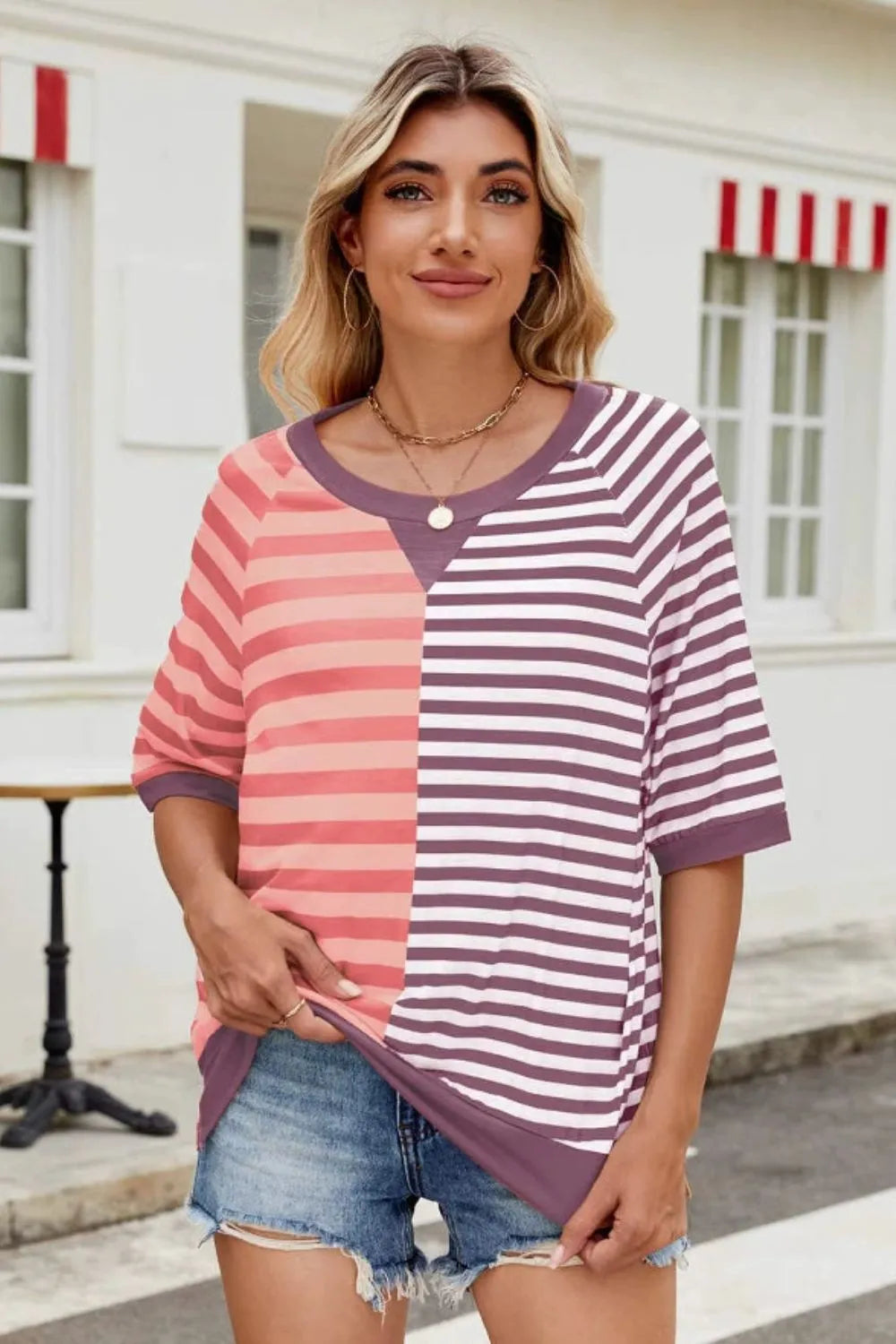 Striped round neck half sleeve T-shirt from Trendsi, casual tops with a comfortable fit and stylish striped pattern.