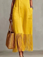 Plus size Shopimist full size fringe V-neck spaghetti strap dress, featuring a stylish design and flowing fabric.