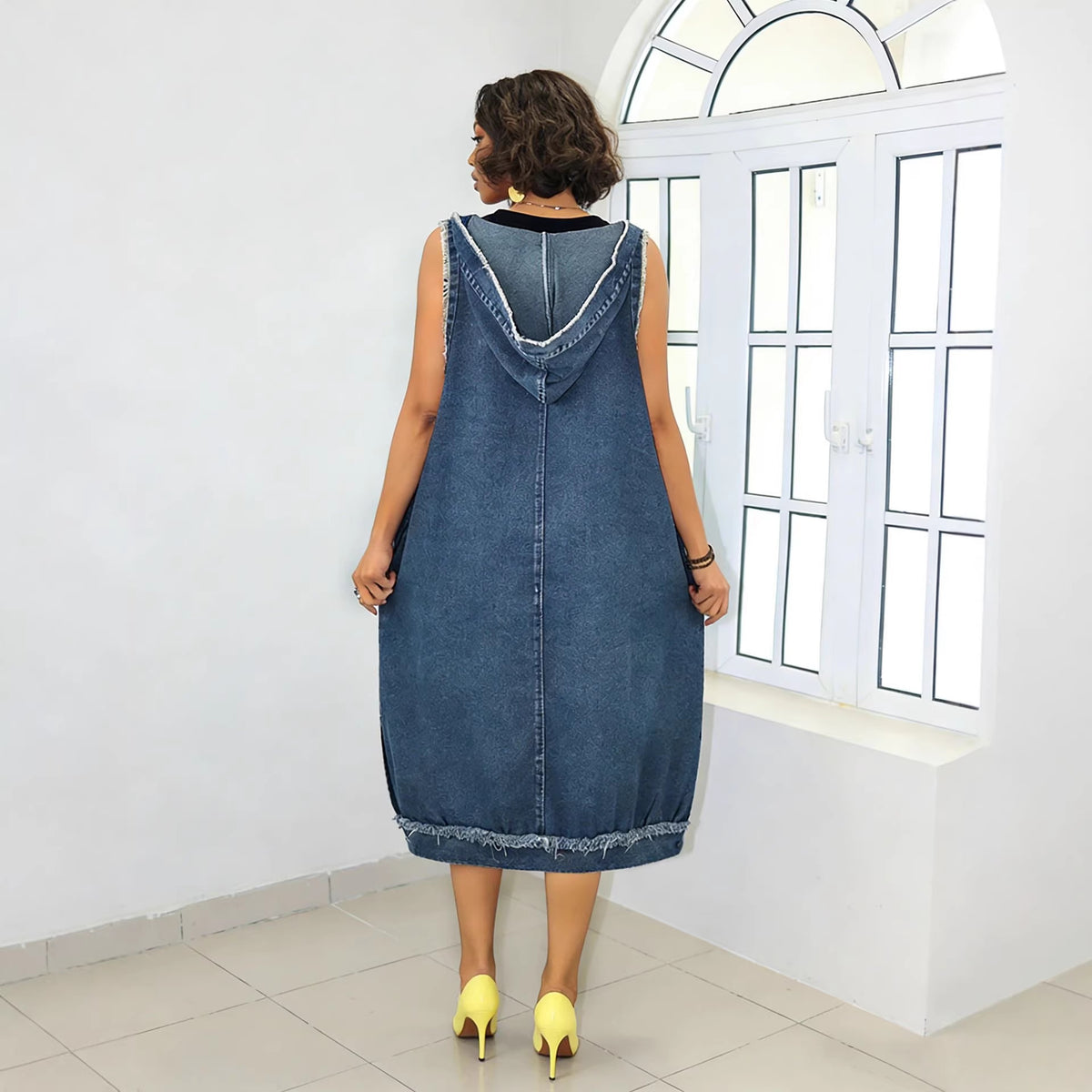 Eprolo frayed edge cocoon hooded oversized midi dress with front pockets, relaxed fit and casual style, shown in the image.