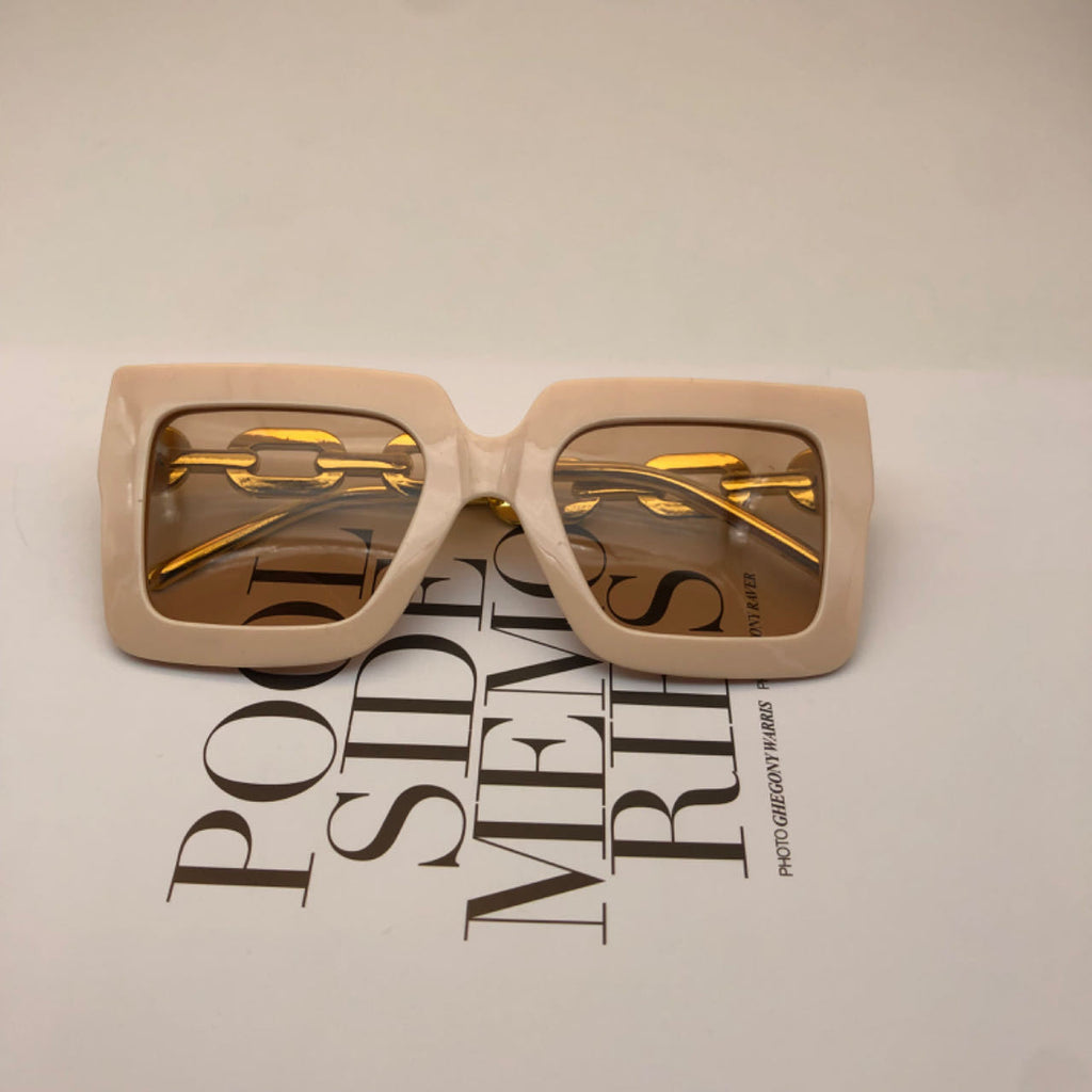 Square chain sunglasses for women with stylish frames and chain detailing by FitiqueFit, shown on a model.