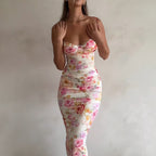 Women’s floral bodycon maxi dress by FitiqueFit with spaghetti straps, perfect for summer or vacation casualwear.