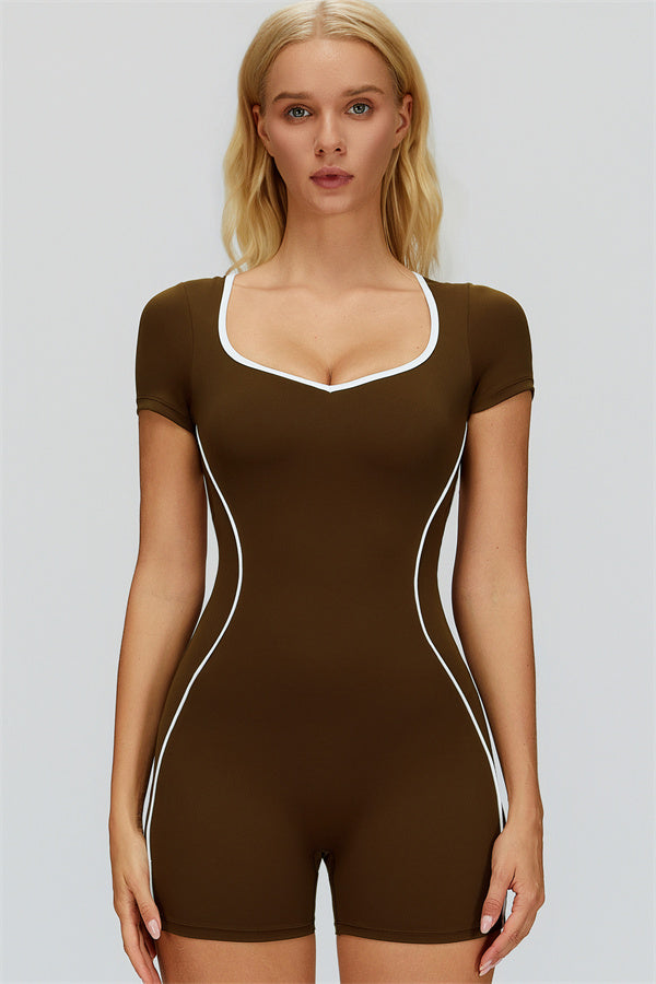 Fitglutes Activewear The Whisper Romper in black, featuring a fitted design with adjustable straps for gym and workout sessions.