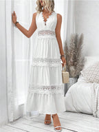 Sleeveless Swiss dot lace maxi dress with ruched tie detail from Trendsi, featuring a flowing silhouette and intricate lace pattern.