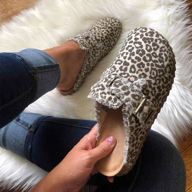 Leopard print Baotou slip-on shoes with half-support design by Plush Fashion Hub, featuring a stylish and comfortable footwear style.