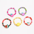 Colorful fruit charm beaded ring from Shopimist featuring vibrant fruit-shaped beads and intricate beaded design.