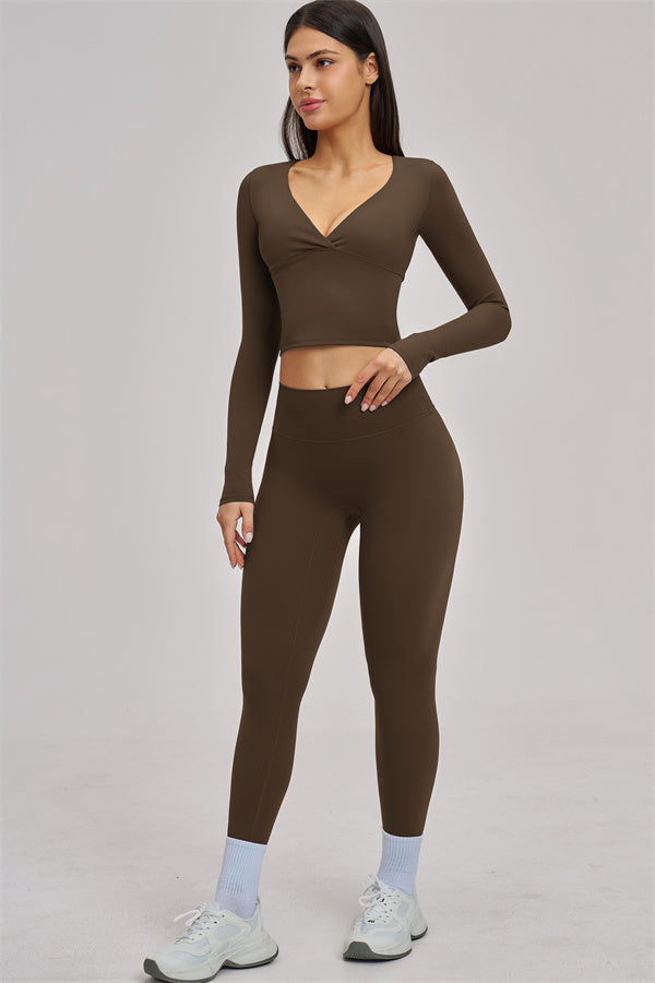 Fitglutes Activewear long sleeve crop top featuring a fitted design, perfect for gym workouts and active sportswear.