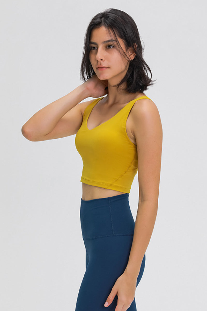 Trendsi Millennia Scoop Back Sports Bra in active wear with a scoop back design, ideal for workout and athletic activities.
