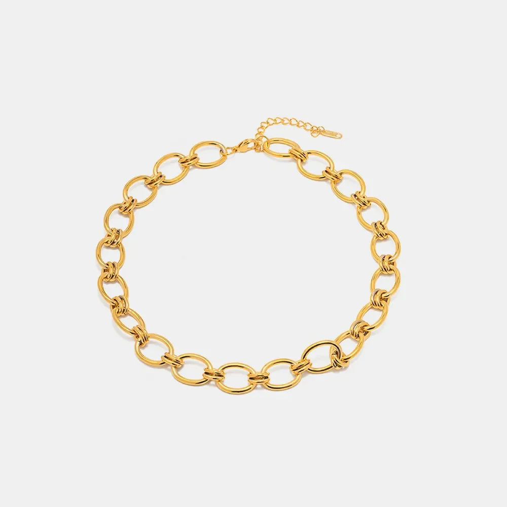 18K gold-plated stainless steel necklace with a sleek chain design, showcasing a shiny, polished finish.