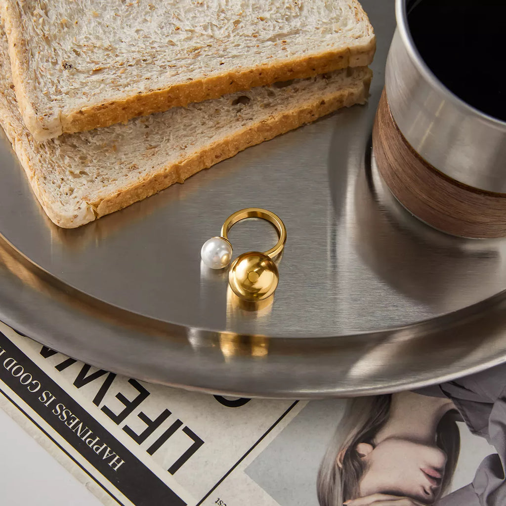 18K gold-plated orb and pearl open ring featuring a sleek design with a large pearl accent, stylish jewelry by Shopimist.