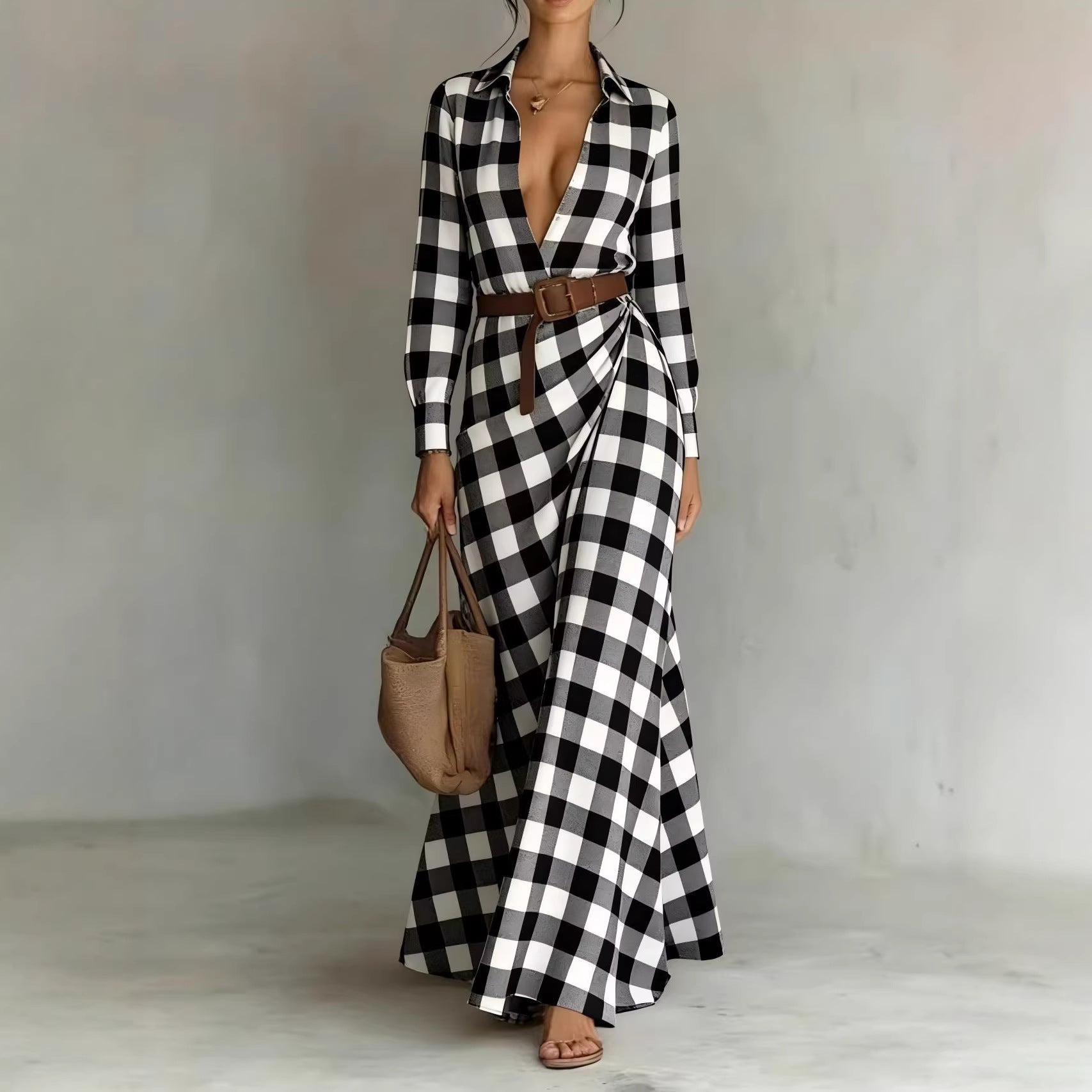 Women's belted irregular pleated dress by Plush Fashion Hub, showing a stylish dress with a waist belt and flowing pleats.