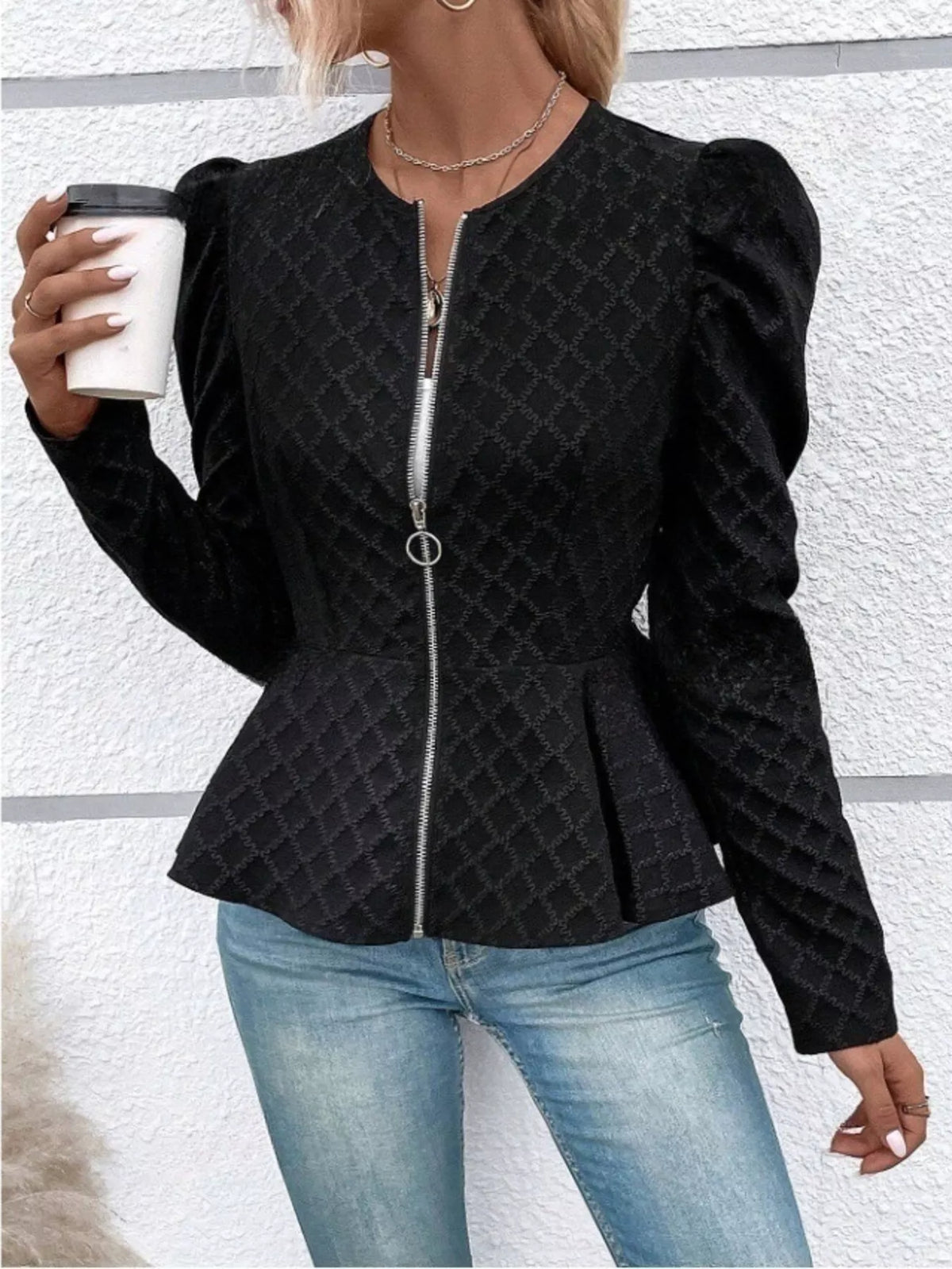 Women’s textured jacquard jacket with puff sleeves, stylish and trendy, by Trendsi, shown in a close-up view of the fabric and sleeve details.