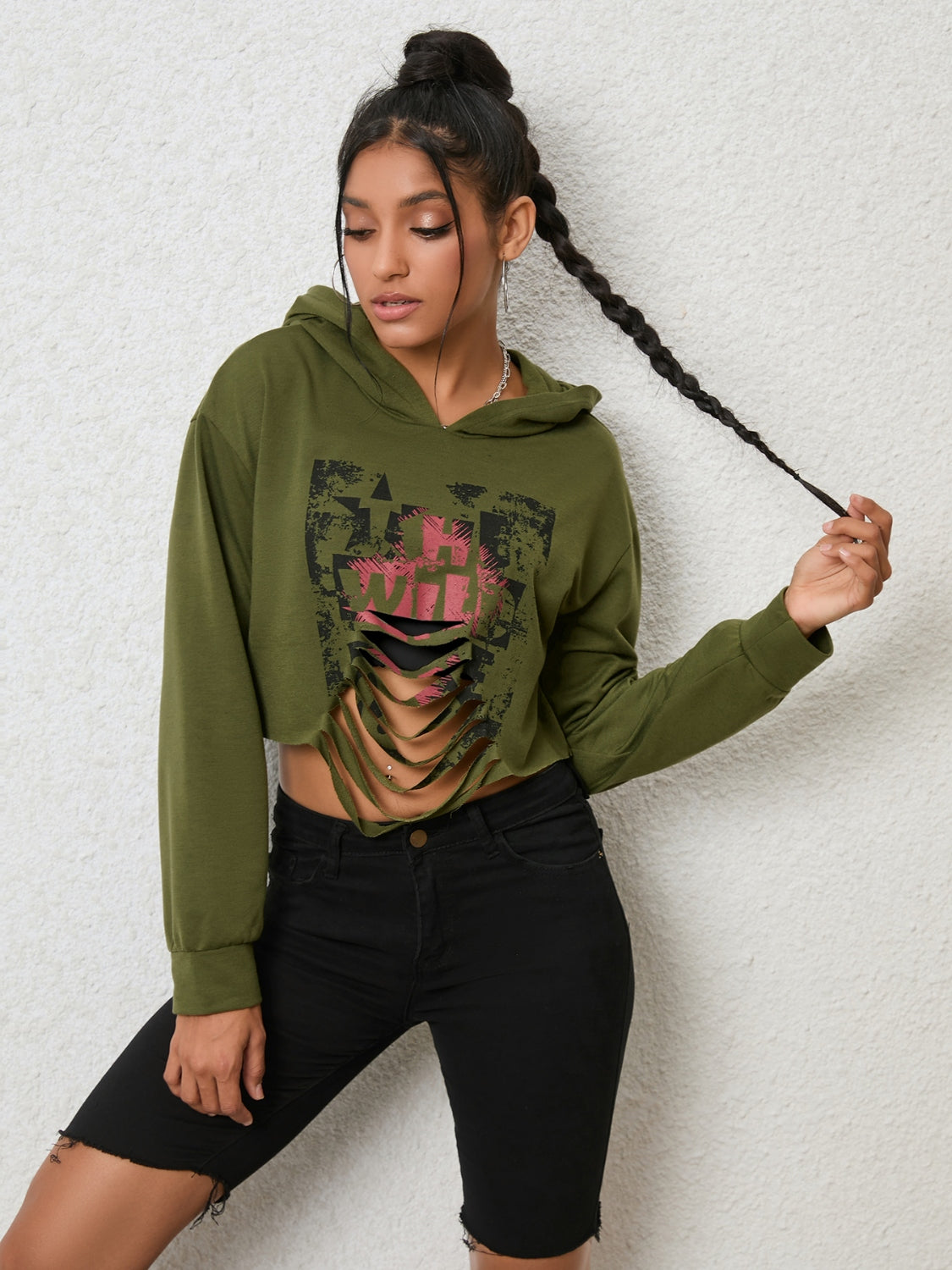 Long sleeve hoodie with cutout design from Trendsi, featuring a stylish and modern top in a casual, comfortable fit.