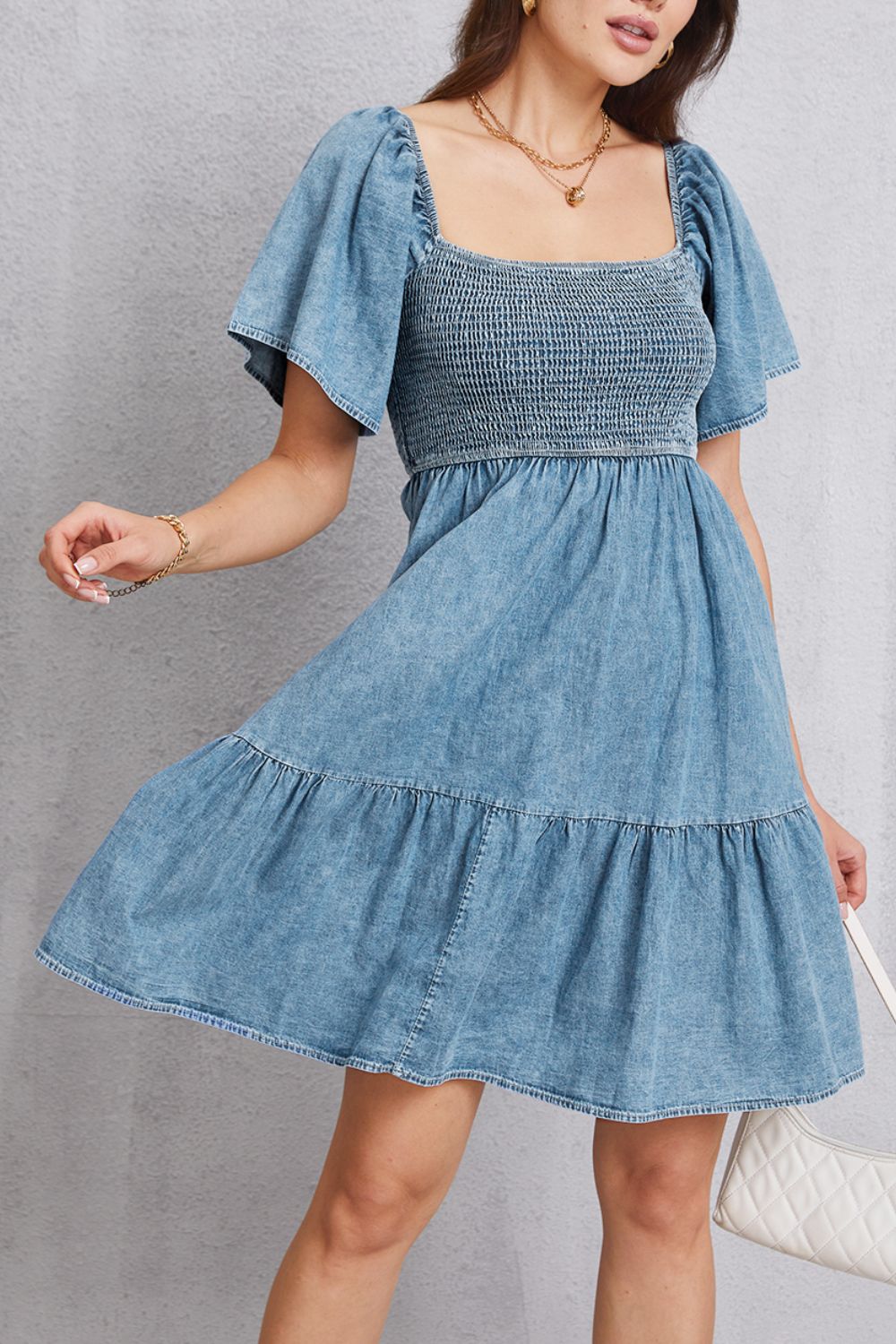 Smocked square neck mini denim dress by Plush Fashion Hub featuring a fitted bodice and casual summer style.