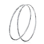 Sterling silver circle endless hoop earrings for women, featuring a sleek and minimalist design from Plush Fashion Hub.