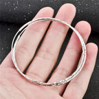 Sterling silver circle endless hoop earrings for women, crafted by Plush Fashion Hub, stylish jewelry gift for women.