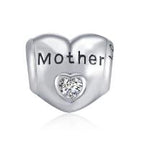 Sterling silver heart zircon bracelet and necklace charm for mother, featuring a delicate design with sparkling stones.