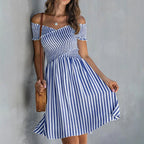 Women's off-shoulder striped waist-cinching midi dress by FitiqueFit, casualwear style with a fitted silhouette and bold stripe pattern.