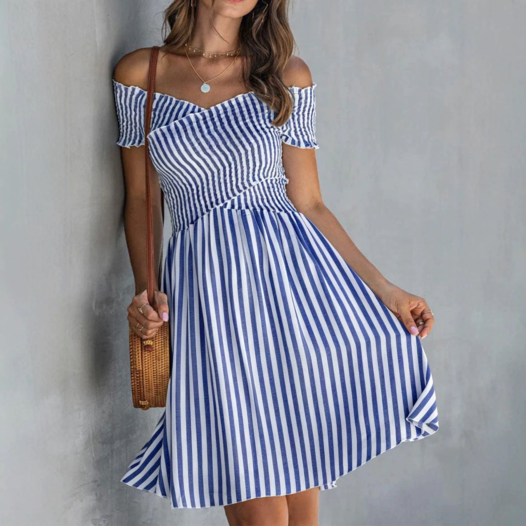 Women's off-shoulder striped waist-cinching midi dress by FitiqueFit, casualwear style with a fitted silhouette and bold stripe pattern.