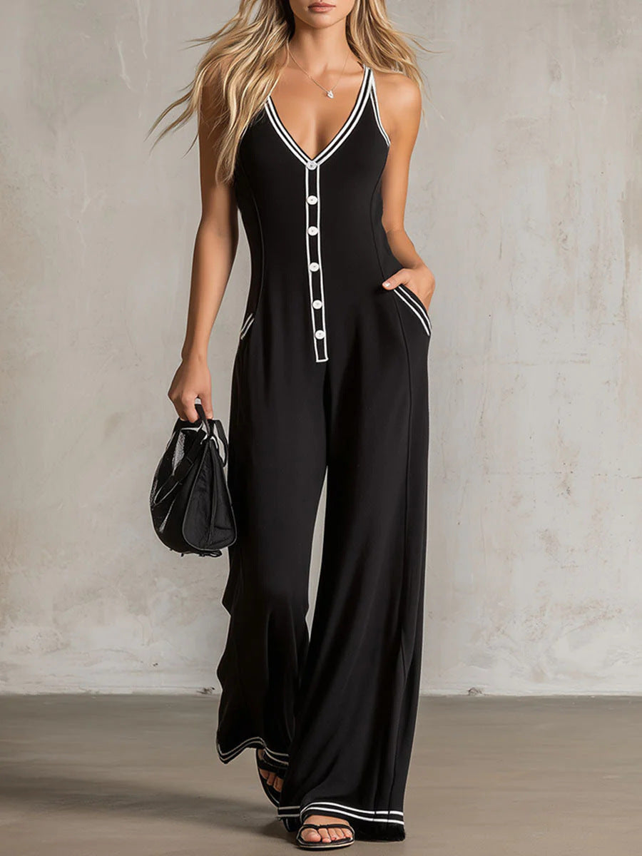 Women's FitiqueFit V-neck backless wide-leg jumpsuit showing high waist design and casual style, perfect for warm weather.