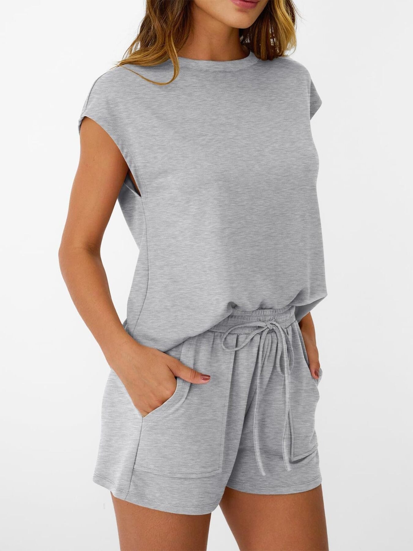 Women’s plush lounge set with soft round neck, cap sleeves, and drawstring shorts in a comfortable 2-piece design.