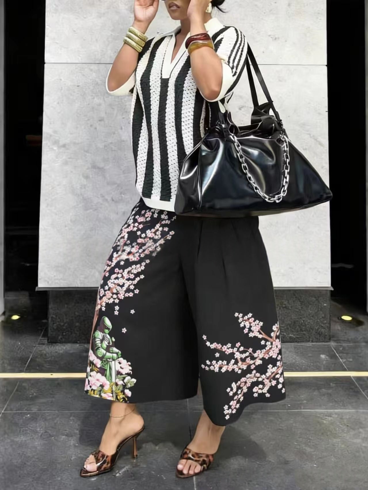 Women's wide-leg cargo pants with zipper and button details from Plush Fashion Hub, featuring a relaxed fit and functional pockets.