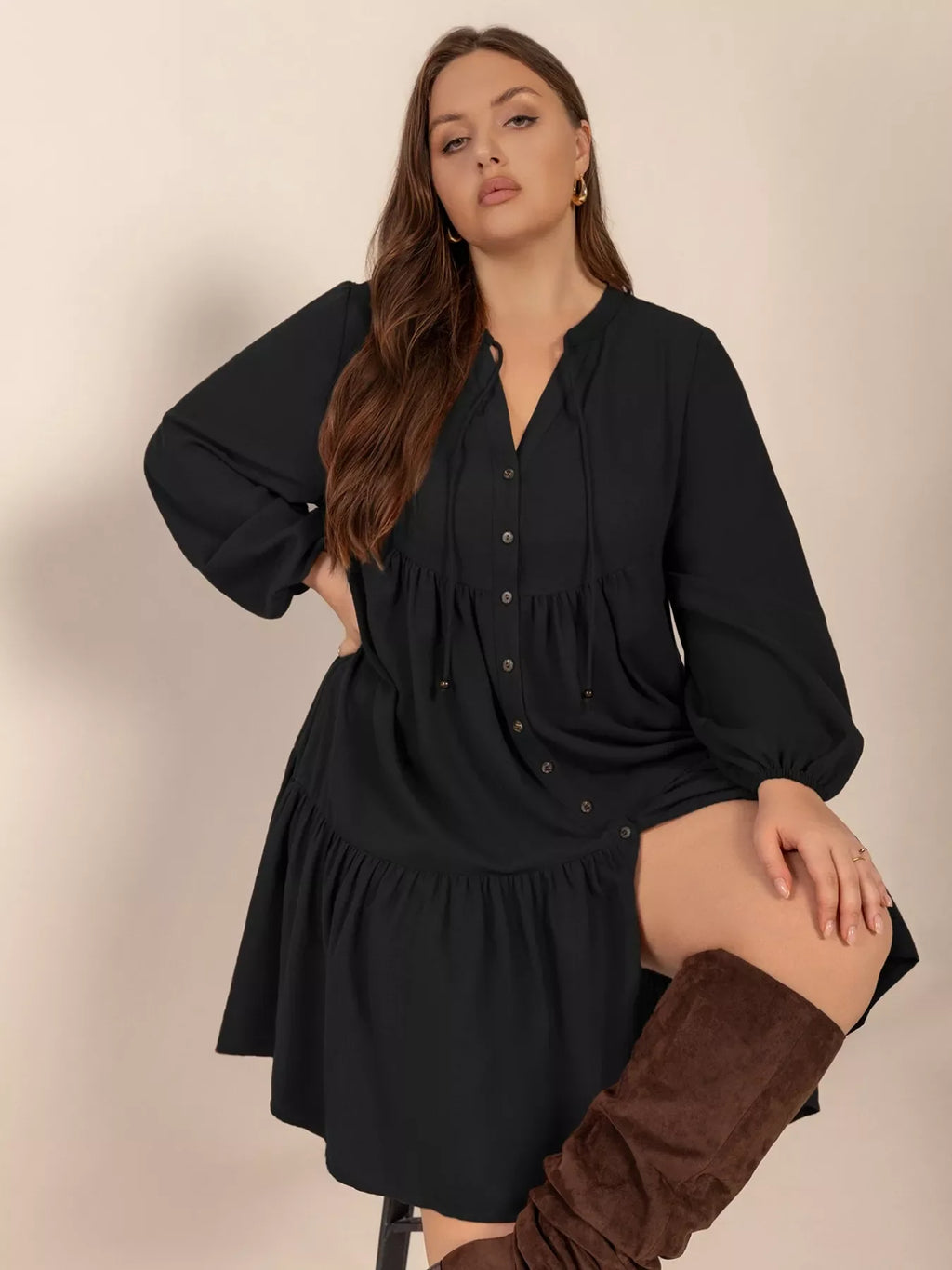 Plus size button front balloon sleeve dress by Shopimist, featuring a flattering fit and stylish design with prominent buttons.