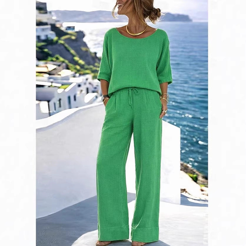Women's resort set by FitiqueFit featuring a short sleeve top and wide-leg pants, perfect for warm weather and vacation wear.