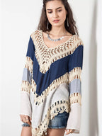 Crochet-trimmed long sleeve swimwear cover-up in lightweight fabric, designed for beach or poolside wear.