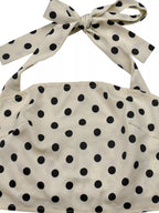 Polka dot halter neck cami and fringe trim pants set featuring rings detail, stylish Trendsi women's fashion ensemble.