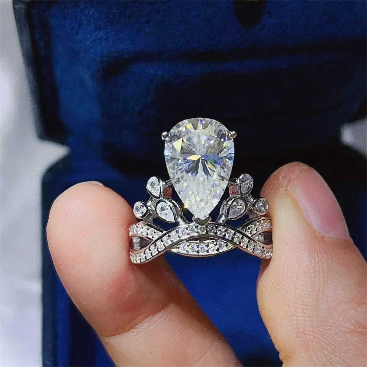 Sterling silver ring with a 5-carat moissanite gemstone, showcasing a sparkling, elegant design.