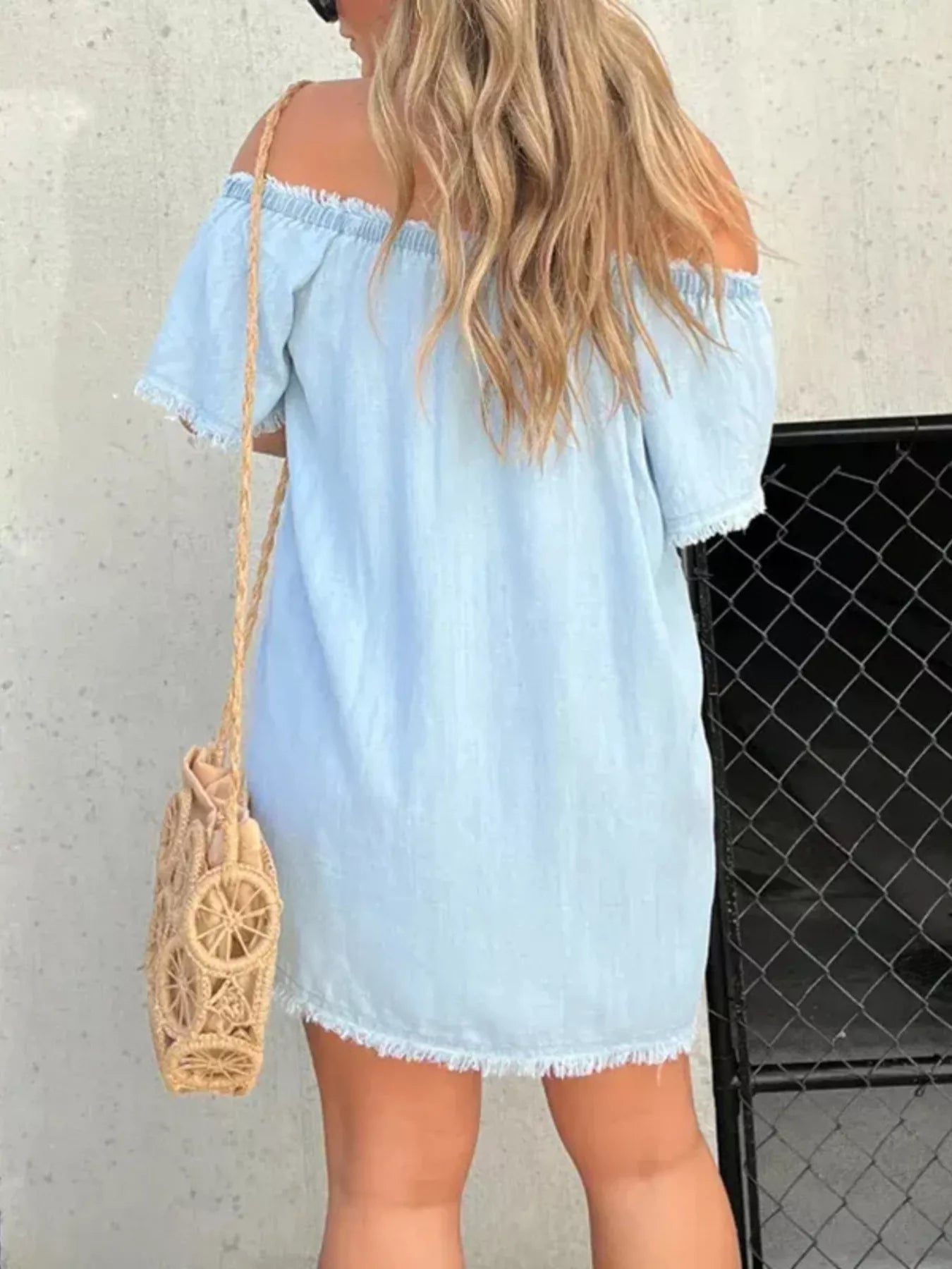Plus size off-shoulder denim dress with button-down front and frayed hem, stylish Trendsi women's casual dress.